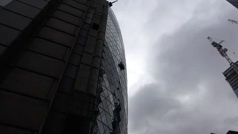Window cleaners on the gherkin Stock Footage 80028124