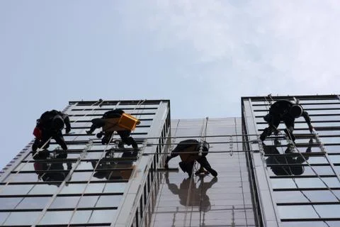 Window cleaners Stock Photos
