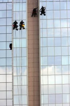 Window cleaners Stock Photos