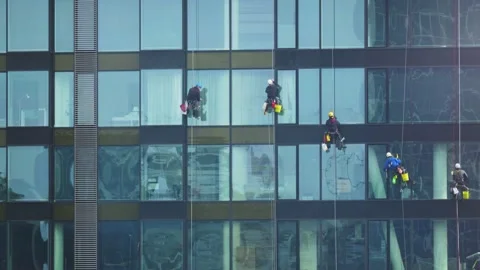 Window cleaners on skyscraper Stock Footage 151229152