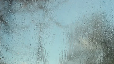 Window cleaning, spraying, water drips on the glass. Stock-Footage 97961138