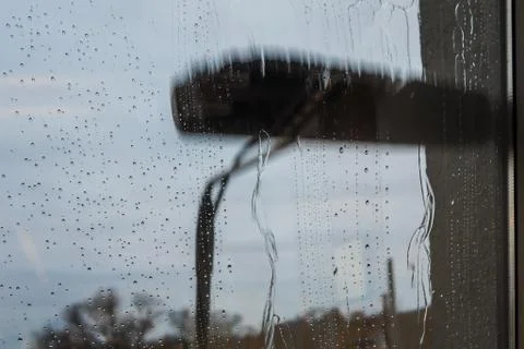 Window cleaning using telescopic water brush and wash system Stock Photos