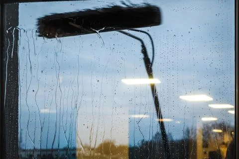 Window cleaning using telescopic water brush and wash system Stock Photos