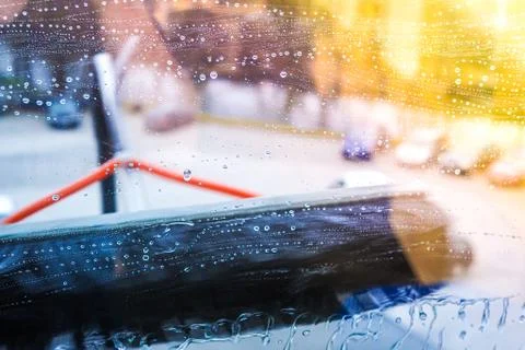 Window cleaning using telescopic water brush and wash system Stock Photos
