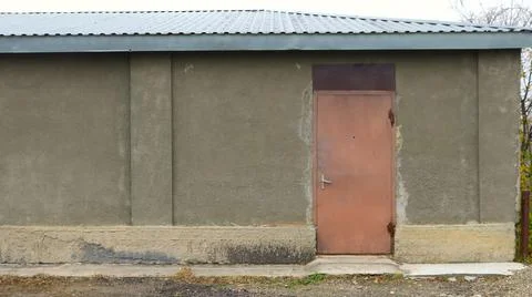 Window closed with plywood shutter vertical frame Stock Photos