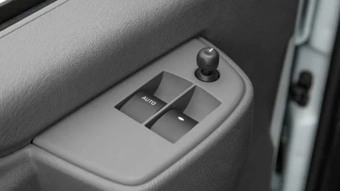 Window control buttons close up 2016 GMC Savana 3500 Passenger Extended 1LS Stock Footage 159855922