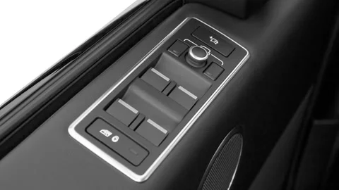 Window control buttons close up 2016 Land Rover Range Rover LWB Supercharged Stock Footage 159864803