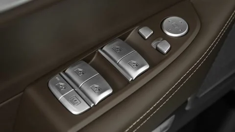 Window control buttons close up 2016 BMW 7-series 750i Stock Footage 159883266