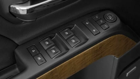 Window control buttons close up 2016 Chevrolet Silverado 1500 LTZ Stock Footage 159887574