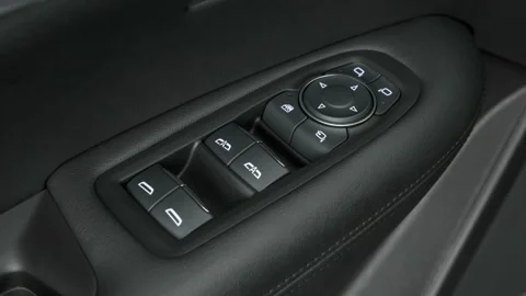 Window control buttons close up 2017 Cadillac XT5 Premium Luxury Stock Footage 159895260