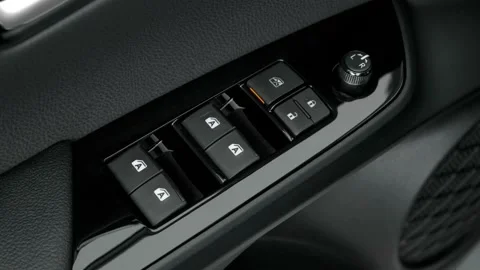 Window control buttons close up 2017 Toyota Prius Two Eco Stock Footage 159914604