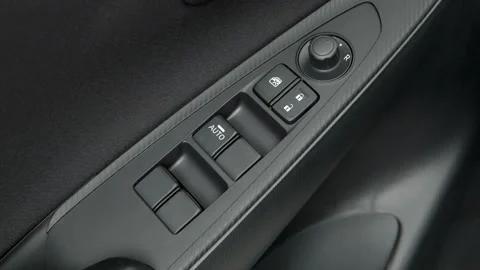 Window control buttons close up 2017 Toyota Yaris iA Stock Footage 159916544