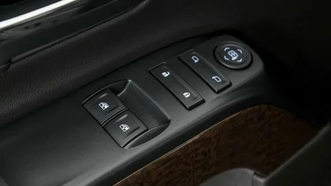Window control buttons close up 2017 GMC Sierra 1500 SLE Stock Footage 159918043