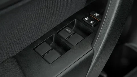 Window control buttons close up 2017 Toyota Corolla LE Stock Footage 159918274