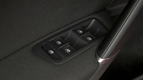 Window control buttons close up 2017 Volkswagen Golf S Stock Footage 159923645