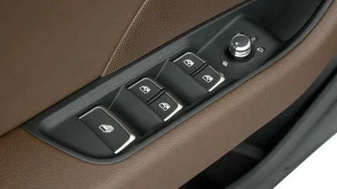 Window control buttons close up 2017 Audi A3 Premium 2.0 TFSI Stock Footage 159930482