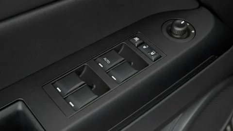 Window control buttons close up 2017 Jeep Patriot Sport Stock Footage 159933754