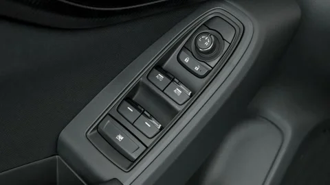 Window control buttons close up 2018 Subaru Crosstrek 2.0i Stock Footage 159937871