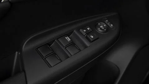 Window control buttons close up 2018 Honda Fit EX-L Stock Footage 159963531