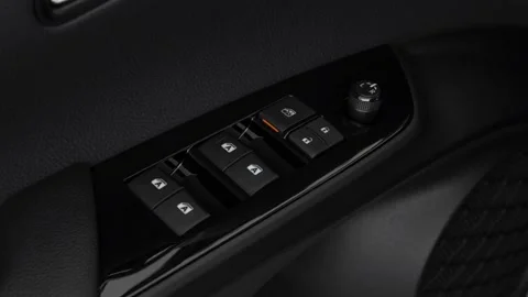 Window control buttons close up 2018 Toyota Prius Three Touring Stock Footage 159993280