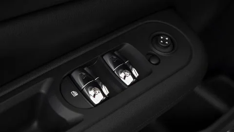 Window control buttons close up 2018 Mini Clubman Cooper Stock Footage 159994153