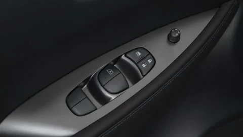 Window control buttons close up 2018 Nissan LEAF S Stock Footage 159999394
