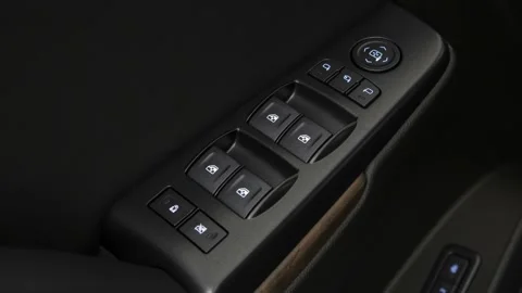 Window control buttons close up 2019 GMC Yukon XL Denali Stock Footage 160022129