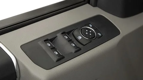 Window control buttons close up 2019 Ford F-350 SD SRW XLT Stock Footage 160029494