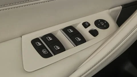 Window control buttons close up 2020 BMW 5-series M550i xDrive Stock Footage 160087214