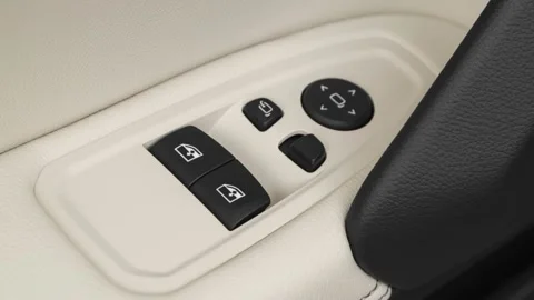 Window control buttons close up 2020 BMW Z4 Roadster sDrive30i Stock Footage 160095591