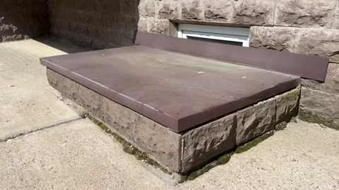 Window is covered with galvanized steel in brown color sheet to protect basement Vidéo 300054905