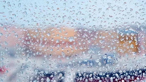 Window covered with melted snow droplets extreme close view Stock Footage 125994916