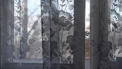 Window curtain develops in the wind. White curtain. The wind blows. Video stock 106568747