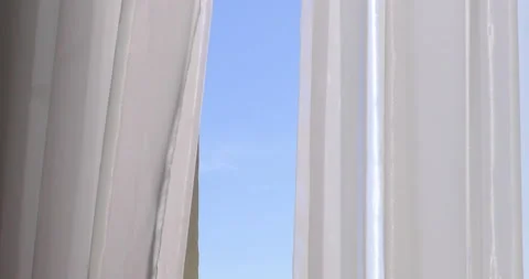 Window with curtains and a view of the sky. Stock Footage 88351145