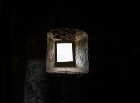 A window from a dark old room. 写真素材
