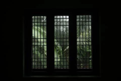A window in a dark room Stock Photos