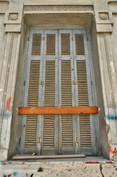 Window with decorative meander pattern Stock Photos