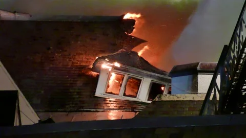 Window destroyed at massive fire Video stock 139657435