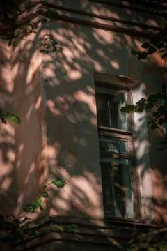 Window in the destroyed old house Stock Photos