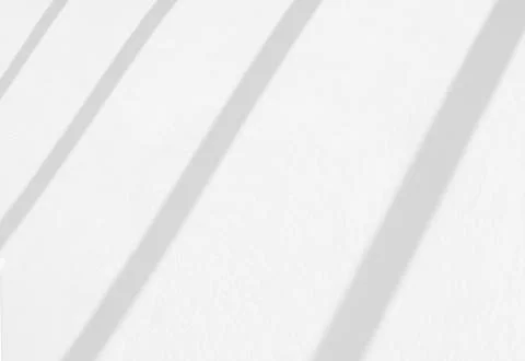 Window drop diagonal shadow on white wall Stock Photos