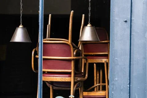 Window of an empty restaurant forced to close amid COVID-19 pandemic Stock Photos