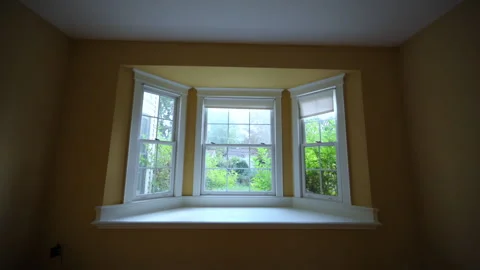 A window in the empty room of the residential house.. Wide view Stock-Footage 322538819