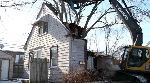 Window exploding during demolition of House Stock Footage