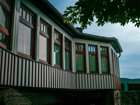 Window facade of a castle in the evening Stock-Fotos