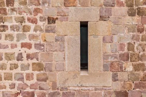Window on facade of fortress Stock Photos