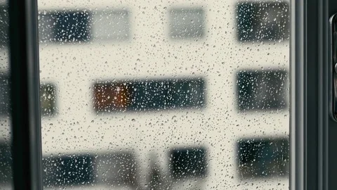 Window filled with falling rainy drops Video stock 73912709