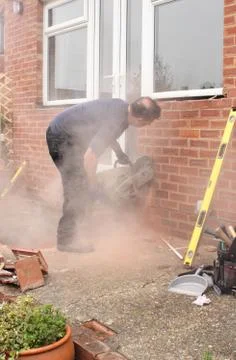A window fitter using a disc cutter Stock Photos