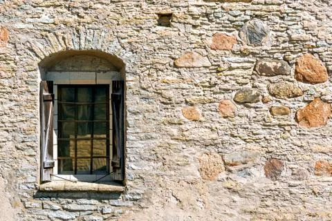 Window on the fortress wall. Stock Photos