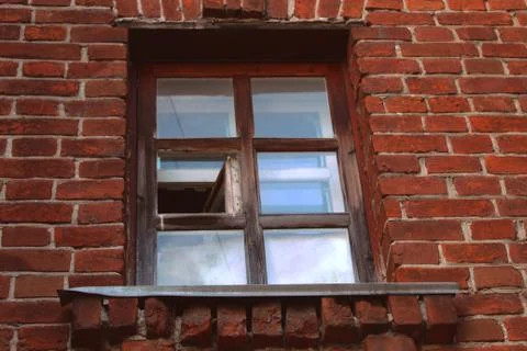 The window frame in a brick building Stock Photos