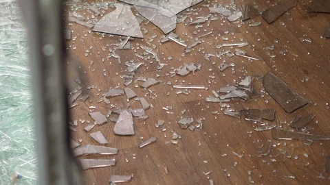 Window frame with broken glass close-up Stock Footage 111975476